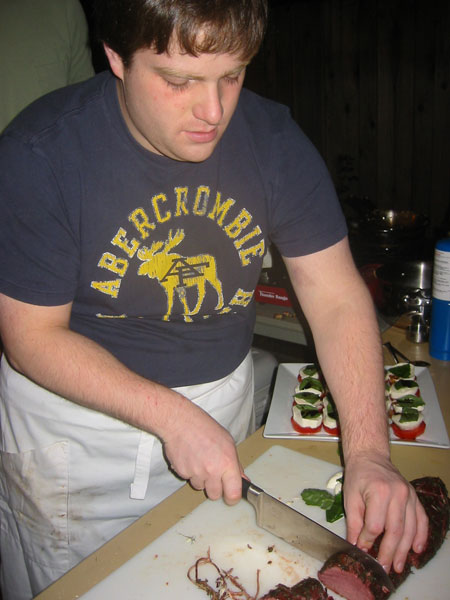greg cutting meat